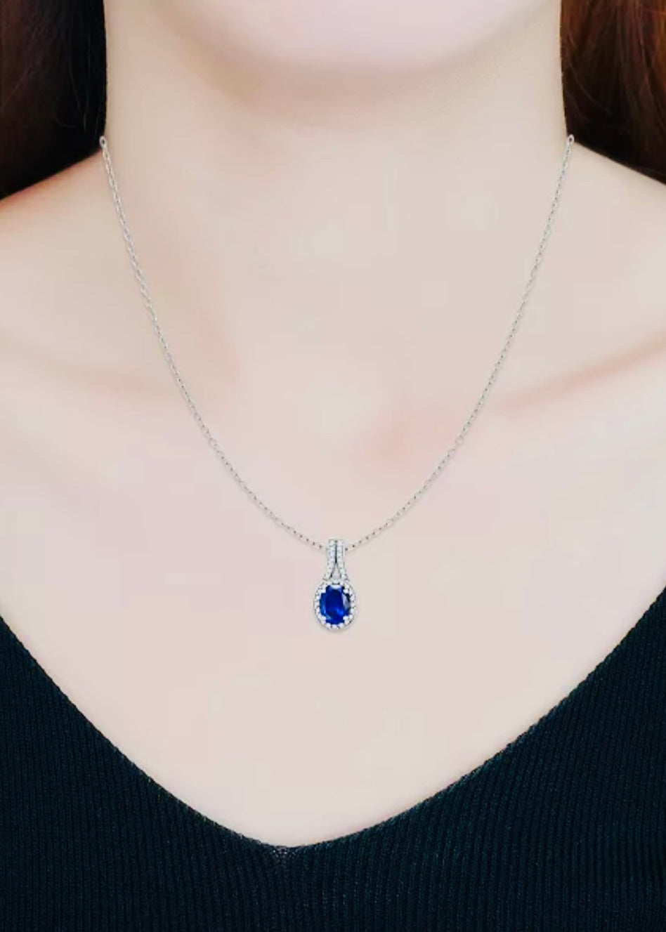 Julia Capri Simulated Blue Sapphire and Cubic Zirconia Halo Pendant